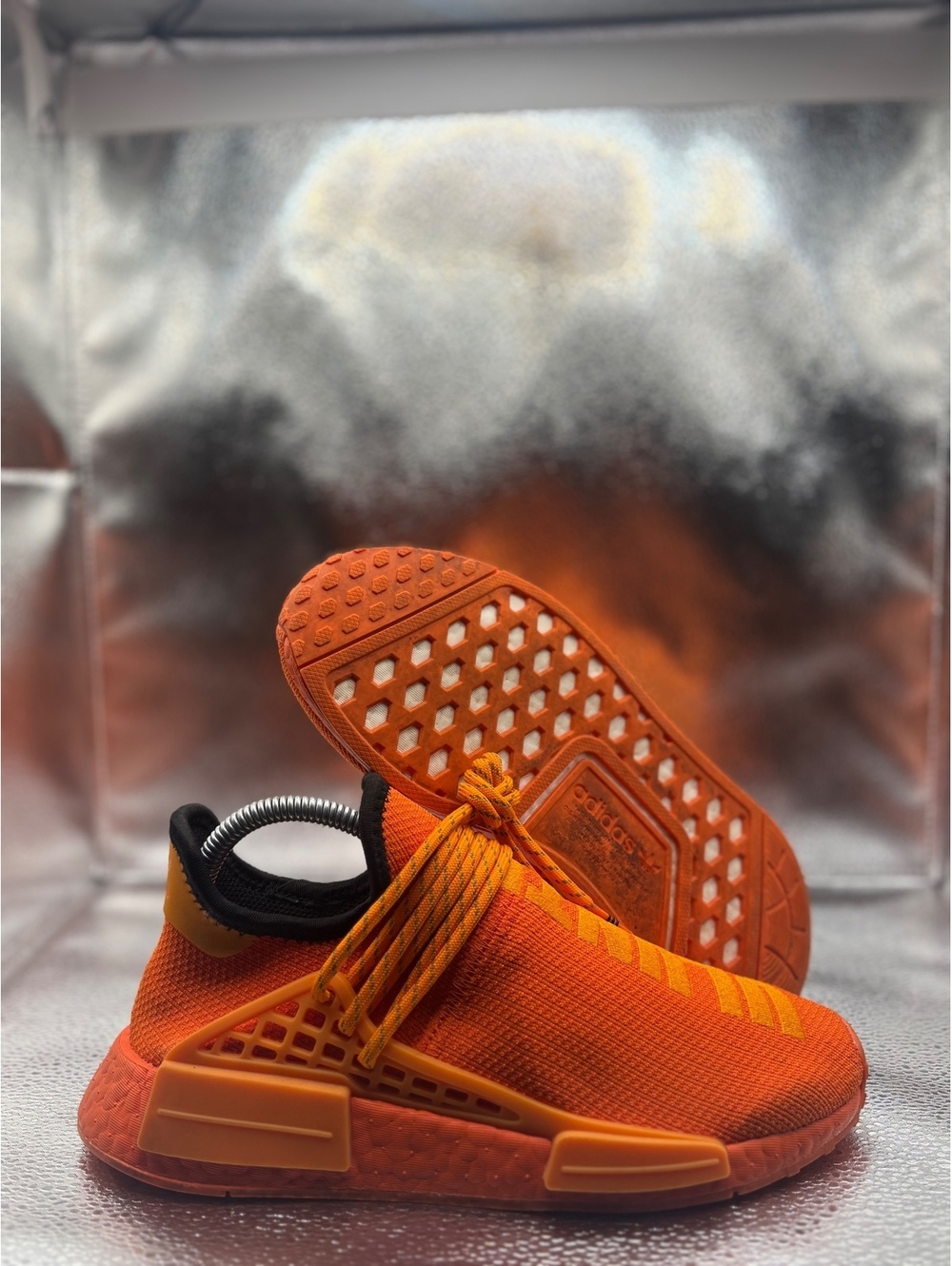 Pharrell x adidas NMD Human Race vibrant orange
